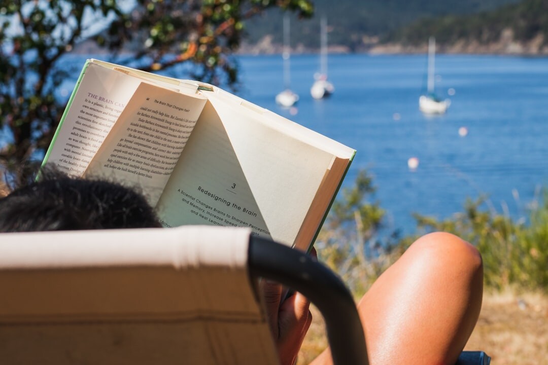 person reading mystery book