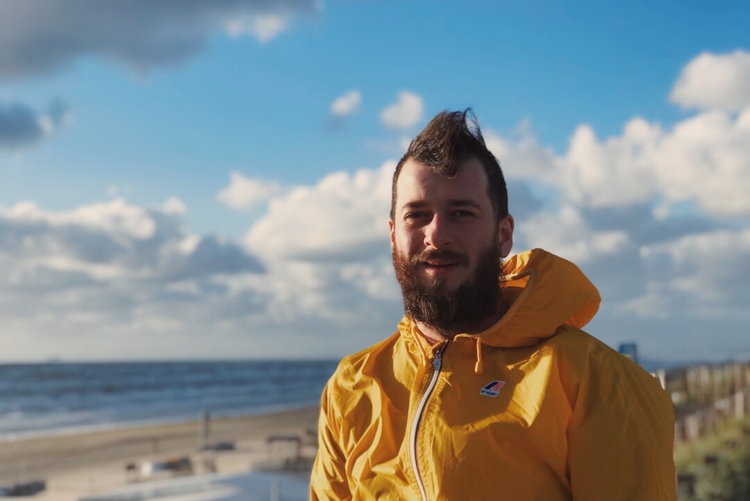 Portrait of a Dutch man in his fifties with a beard, smiling